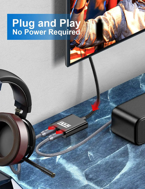 Killer Audio Optical Splitter, 1 In 2 Out Toslink Splitter, Black Universal Adapter connected to TV and headphones.