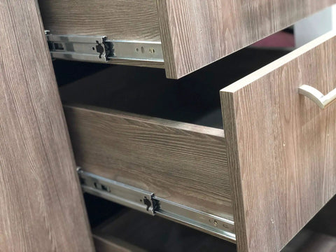 Heavy Duty 3 Pair 16 Inch Full Extension Ball Bearing Side Mount Cabinet Drawer Slides With Rear Brackets Soft Close And Built To Last Quiet Operation 100Lb Per Pair Capacity Zinc Plated Stamped Steel Rust Resistant installed in a wooden drawer.