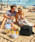 Premium 9 Liter Soft Sided Cooler Bag With Leak Proof Design on beach with picnic food and drinks.