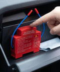 Automatic Aerosol Fire Extinguisher For Car Truck Van And RV With Self Activating Heat Trigger and No Drama Peel And Stick Mount closely viewed in vehicle