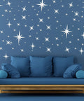 82 Piece 3D Acrylic Mirror Star Wall Stickers Set For Ceiling And Walls, dope removable silver decals on blue wall above sofa
