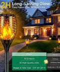 43 Inch Tall Solar Torch Lights With Realistic Flickering Flames 96 LED Outdoor Yard Patio Christmas Decor shown illuminating pathway