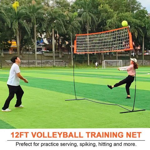 Portable 12ft Volleyball Training Net For Hitting And Serving Drills set up outdoors with two players.