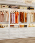 Roomy Walk In Closet Organizer System With Twelve Sturdy Drawers And Open Shelving Units, Freestanding Modular Wardrobe Rack in white with clothes and accessories.