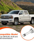 Direct Fit Transmission Cooler Bypass Kit For GM 6L80/90 And 8L90 next to GMC truck in scenic background