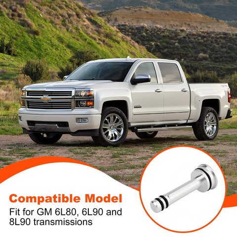Direct Fit Transmission Cooler Bypass Kit For GM 6L80/90 And 8L90 next to GMC truck in scenic background