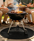 Rugged Waterproof Silicone Fire Mat 36x36 Inch beneath grill with people around, protecting patio during BBQ