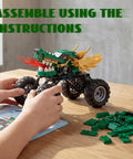 Monster Dragon Truck Building Kit For Kids Green, Kid-Approved DIY Construction Toy Set For Boys And Girls, Imagination-Driven Play, Hands-On STEM Construction, Durable Buildable Truck With Endless Creative Options. assembled green dragon truck with wheels