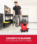 Compact 4 Gallon Wet Dry Shop Vac With 3.5 Peak Hp Motor and Kickin Suction for Garage Cleanups in use, converting to blower.