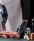 High Density Cut Resistant Arm Sleeves Two Pack Legit Tough As Nails Forearm Guards used while cutting meat with a knife.