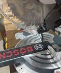 Custom 3D Printed Dust Collection Attachment For 12 Inch Glide Miter Saw GCM12SD Dust Port Adapter attached to saw