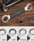 Portable 35 Piece Bike Repair Tool Kit With Storage Case For Road And Mountain Bikes wrench set on wooden surface.