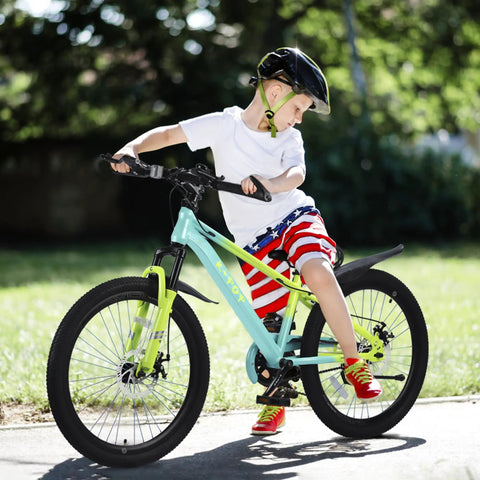 Child riding 24 Inch Kids Mountain Bike For Boys And Girls Ages 8 To 12 With Front Suspension Fork Single Speed Design Front And Rear Disc Brakes