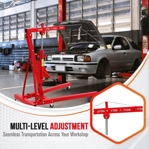 High Capacity Folding Engine Hoist With Hydraulic Leveler Garage Crane Auto Repair Lifts Transmissions And Blocks Up To Two Ton 4400 Lbs Crush Weight No Sweat Garage Essential in a workshop with a car.