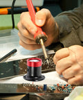 Person using Pro Grade Metal Loupe Magnifier For Watch Repair And Jewelry Making Lightweight Handheld Jewelers Loop With Scale