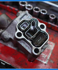 Honda Prelude VTEC Solenoid Gasket Spool Valve Filter Screen Replacement Kit in a mechanics tool setup