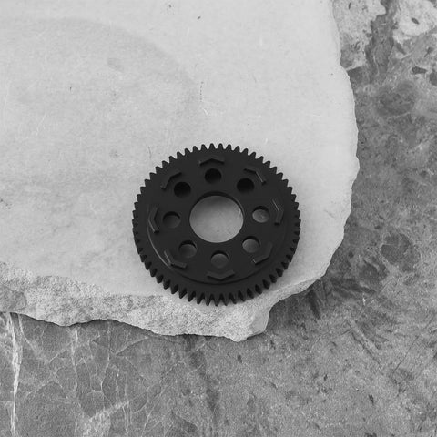 32P 0.8 Mod 57T Carbon Steel Spur Gear For Arrma 1/10 3S RC Cars on a textured surface
