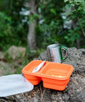 Ultra Handy Flexible Collapsible Mess Kit For Outdoor Survival Camping And Hiking BPA Free Kitchen Gear on tree stump