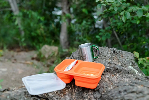 Ultra Handy Flexible Collapsible Mess Kit For Outdoor Survival Camping And Hiking BPA Free Kitchen Gear on tree stump