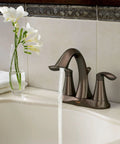 Eva Oil-Rubbed Bronze Two-Handle Centerset Lavatory Faucet With Drain Assembly for 4-Inch Countertop Bathroom Sink, water flowing
