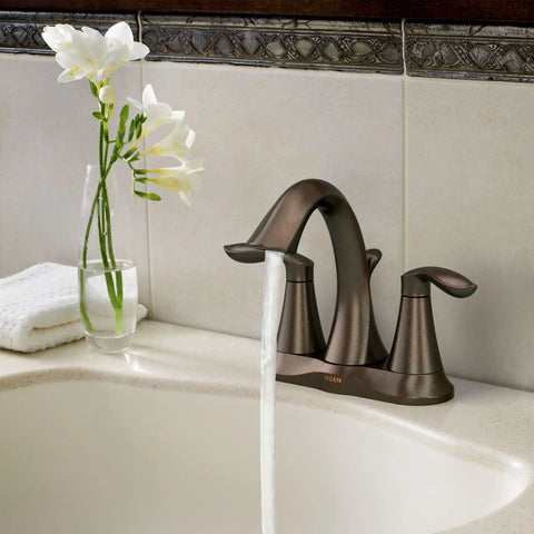 Eva Oil-Rubbed Bronze Two-Handle Centerset Lavatory Faucet With Drain Assembly for 4-Inch Countertop Bathroom Sink, water flowing