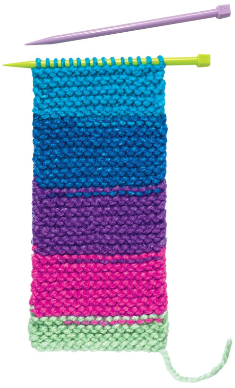 Learn To Knit Pocket Scarf Kit For Beginners, colorful yarn and needles showing progress on scarf with secret pocket.