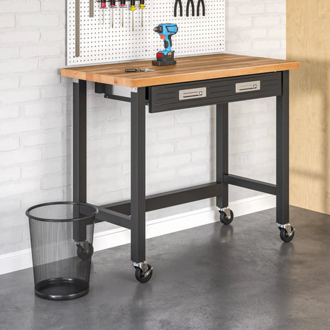 2 Pack Steel Mesh Round Trash Cans 6 Gallon Black Built Tough For Home Office Garage Durable Wastebaskets next to workbench