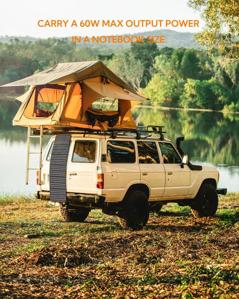 Off-road vehicle with rooftop tent equipped with 60W Foldable Portable Solar Panel Charger With PD USB C And QC3.0 USB A Outputs Waterproof