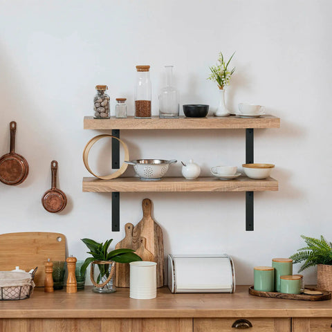 Wooden shelves mounted with Quarter Inch Thick Heavy Duty Shelf Brackets 4 Pack For Rustic Farmhouse Floating Shelves Industrial Wall Mount