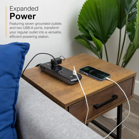 7-Outlet Surge Protector With 2 USB Ports, 3 Ft Flat-Plug Extension Cord, 1780-Joule Protection in use on wooden table