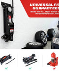Wall Mount Jack Stand Organizer Rack For Heavy Duty Hydraulic Trolley Jacks Garage Wall Mounted Tool Holder Brackets For Racing Cars Trailers Trucks And Maintenance Space Saving Storage Solution installed in a garage next to wheels and a car.