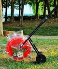 Corn And Soybean Seeder Hand Push Roller Seeder No Fuss Seeding And Fertilizer Applicator with clear seed storage box outdoors