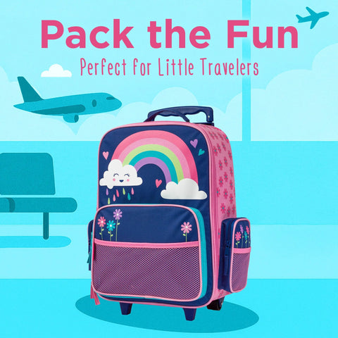 Stephen Joseph kids rolling luggage, navy with rainbow and cloud design, pink side panels and front mesh pocket