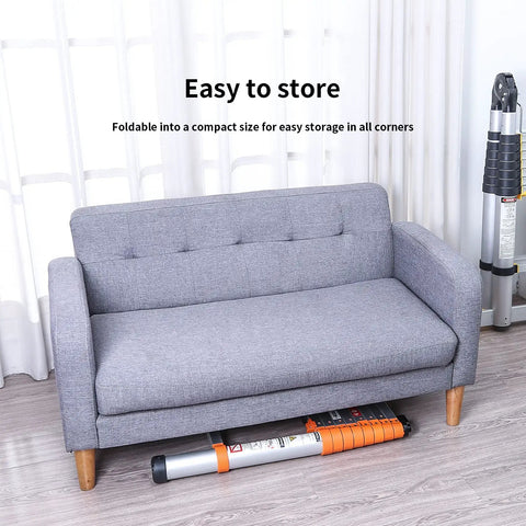 One-Button Retractable Telescoping Attic Ladder 8.5 Ft showing compact storage under sofa