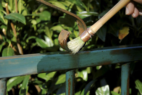 Applying All In One Heavy Duty Rust Inhibitor For Metal And Wood And Paint Conditioner 34 Oz Prevents Corrosion Improves Paint Flow to outdoor rail