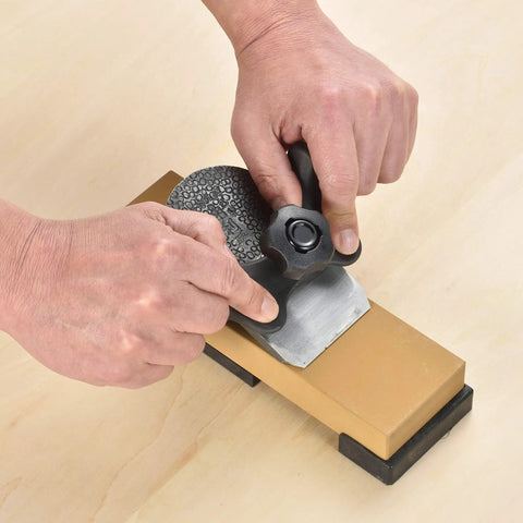 Hands using Honing Guide Sharpening Jig For Chisels And Planes Blades Japanese Woodworking Tool Guide with Pro Grade Angle Control