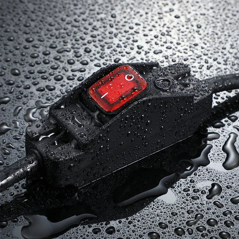 Heavy Duty Outdoor Waterproof Extension Cord With On Off Switch, 6 Foot SJTW Power Cable shown wet with water droplets