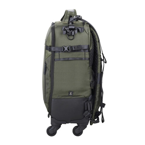 Side view of 55BT Carry On Camera Backpack Trolley For DSLR And Mirrorless Gear Green, featuring sturdy wheels and quick access pockets.