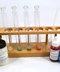 Hands On Food Nutrients Chemistry Lab Kit For Classrooms To Test Carbs Lipids And Proteins Using Benedicts Solution Biuret Reagent Iodine And Fat Soluble Dye For 15 Student Groups with test tubes, reagents, and wooden holder.