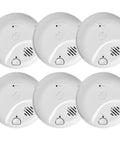 Top Shelf Hardwired Smoke And Carbon Monoxide Detector Combo Built Tough With Rock Solid 10 Year Battery Backup Fully Linked Whole House Fire Safety Alarm Hassle Free 6 Pack Bundle displayed in a cluster of six.