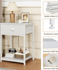 Small Space Friendly White Nightstand With Fabric Drawer And 3 Tier Storage End Table For Living Room Bedroom Or Dorm Durable Night Stand With Adjustable Feet Sturdy Build For Daily Use shown with decor and books