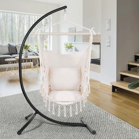 Indoor Hammock Chair With Rope Swing, Macrame Boho Hanging Chair With 2 Cushions in a modern living room, supports up to 330 lbs