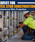 Worker installing wiring using 100 Pack Half Inch Snap In Bushing Grommet Set For Cable Holes And Wire Panels in construction site.