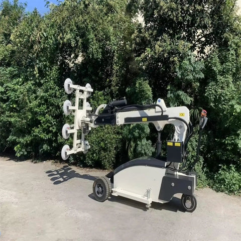 Heavy Duty Electric Glass Vacuum Lifter With Wireless Remote And Suction Cup Hoist For Pro Installers That Pulls Serious Weight and moves glass panels in outdoor setting.