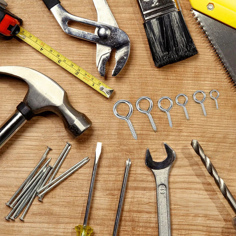 100 Piece Eye Bolts And Eye Screws Hooks Set For Hanging Crafts DIY Projects Assorted 5 Sizes M2.5 M3 M4 on a wooden surface