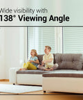 Two children laughing on a sofa viewed with CapsuleCam Pro Baby Monitor 2 Pack Dope 1080P HD WiFi Indoor Security Cam's 138° angle.