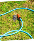 Heavy-Duty 3PC Pipe Threader Tool Kit For Plastic And Metal Water Pipes with a blue hose on grass.