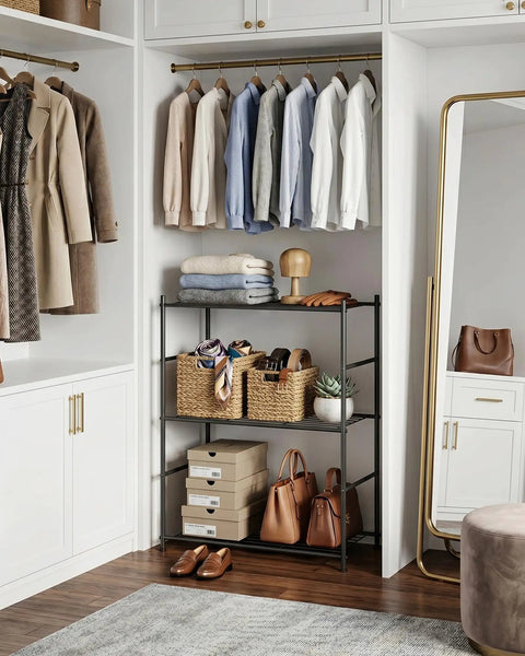 Three Tier Metal Storage Shelf Organizer For Small Spaces With Adjustable Feet Space Saving Heavy Duty Shelving Unit For Kitchen Garage And Laundry Room Each Shelf Supports Up To 100 Lbs Black in closet with clothes, shoes, and baskets displayed.