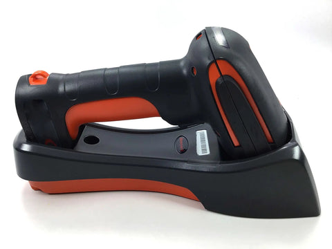 Side view of Granit 1911i ER Extended Range Wireless Bluetooth Heavy Duty Barcode Scanner Kit resting on its charging base.