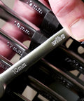 Close-up of 12 Piece Metric Wrench Set For Pro Mechanics with 10mm wrench, Chrome Vanadium design, comfort grip handles visible.